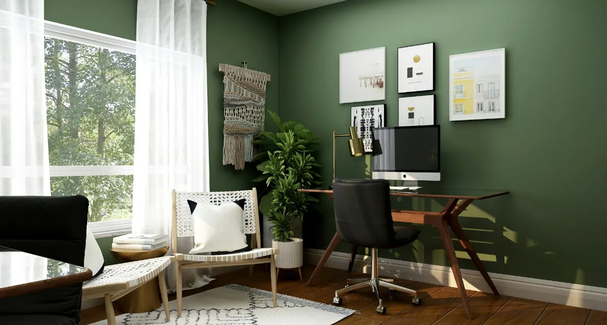 Bureau à domicile lumineux aux murs vert sapin, avec grande fenêtre et plantes